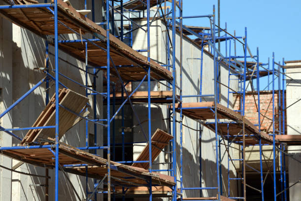 istock Scaffolding Elements Construction. Metal scaffolding tubes and bars. Construction site details. 1034941412