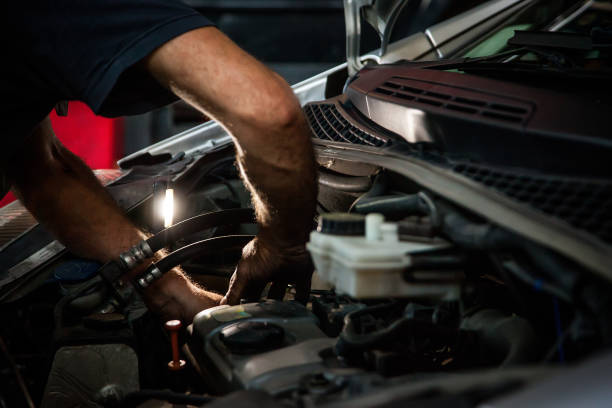 istock Repairing engine in auto repair shop 1034951866