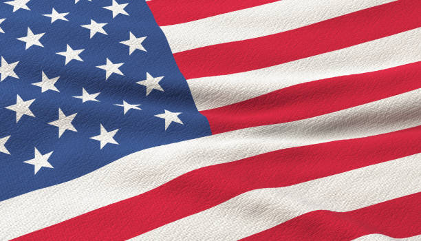 istock USA flag waving in the wind. 1034955134