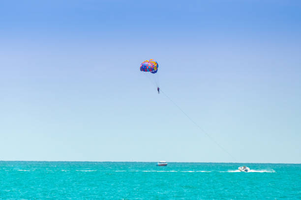 istock parasailing on the sea 1034956426