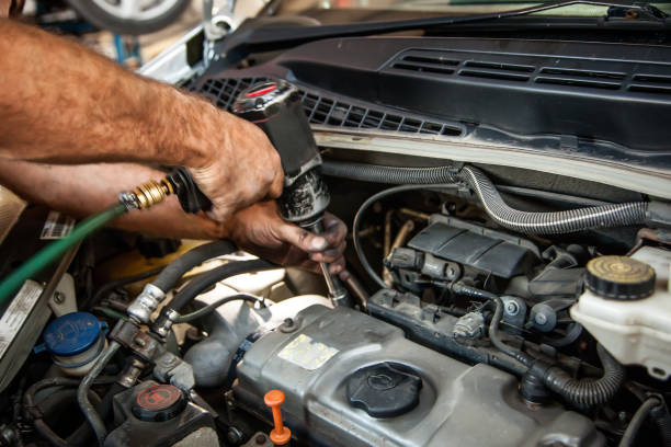 istock Repairing engine in auto repair shop 1034960034