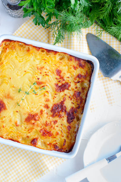 istock Potato casserole in ceramic form, top view, selective focus 1034964658