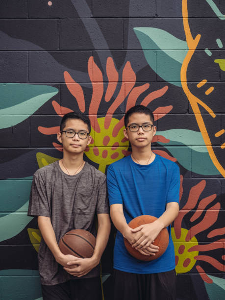istock Twins at basketball 1034971282