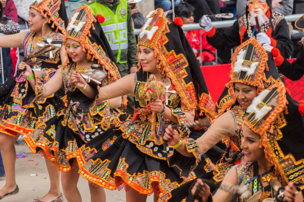 Dancers at Oruro Carnival in Bolivia. The traditional and popular Oruro Carnival is an UNESCO's Masterpieces of the Oral and Intangible Heritage of Humanity. It is held every year at the streets of Oruro city on the Altiplano of Bolivia.