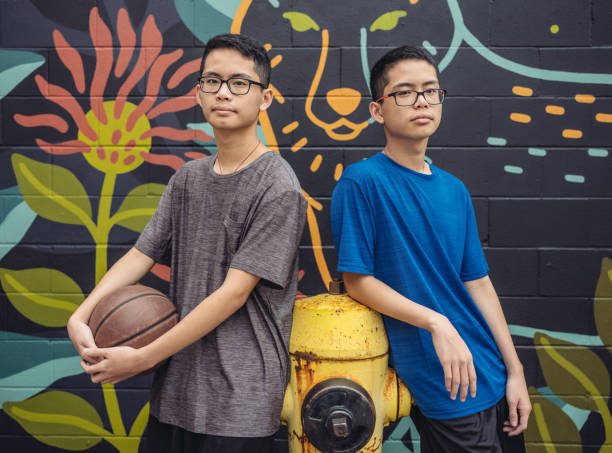 istock Twins at basketball 1034974250