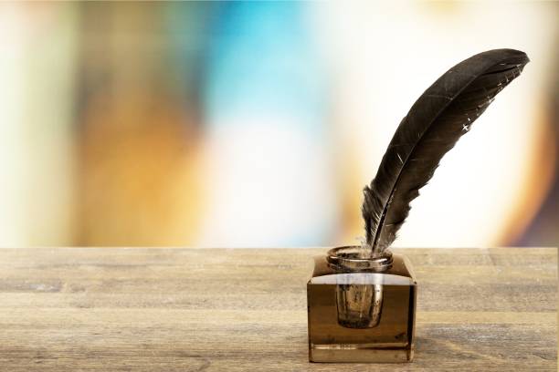 istock Quill pen with inkwell. 1034974846