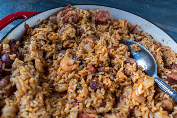 istock Baking dish with shrimp, sausage, and rice jambalaya 1034975602