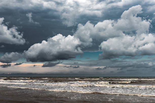 istock Beautiful sky with dense clouds over the stormy sea 1034977348