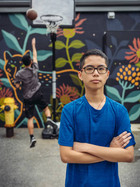 istock Twins at basketball 1034980832