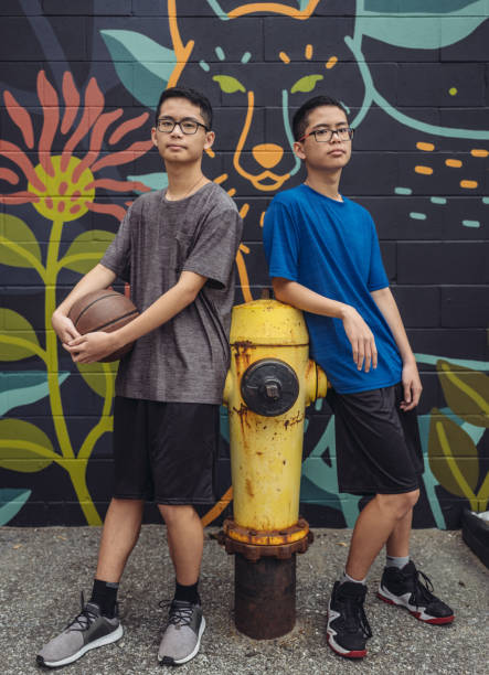 istock Twins at basketball 1034982032