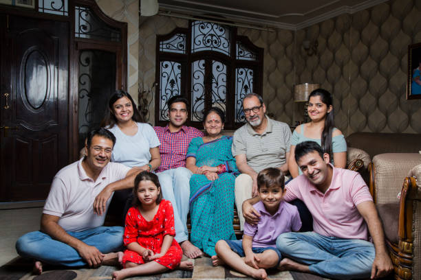 istock Cheerful Multi Generation Family enjoying at home. - Stock image 1034985828