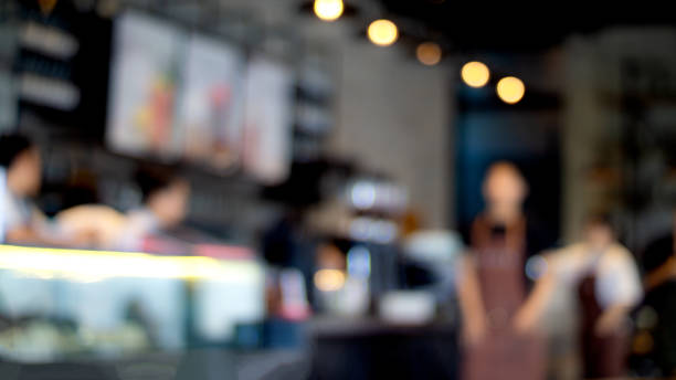 istock Defocused Image Of People In Restaurant 1034986362