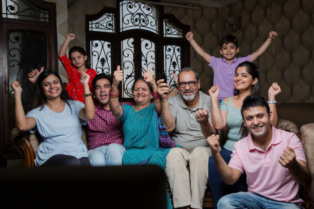 cheerful multi generation family enjoying at home. - stock image - great grandmother imagens e fotografias de stock