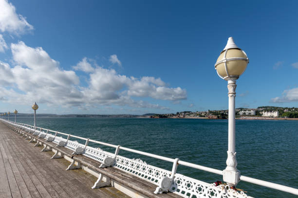 istock Victorian lamp and seating on Princess Pier in Torquay, Devon 1034995066