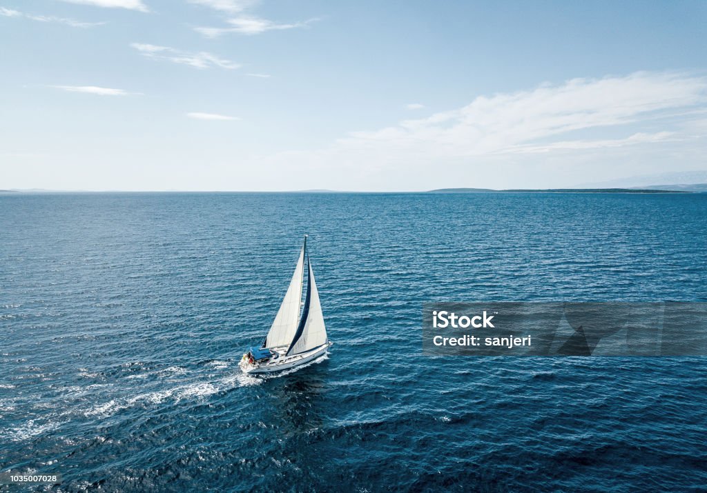 Aerial view of a sailing boat Sailboat Stock Photo