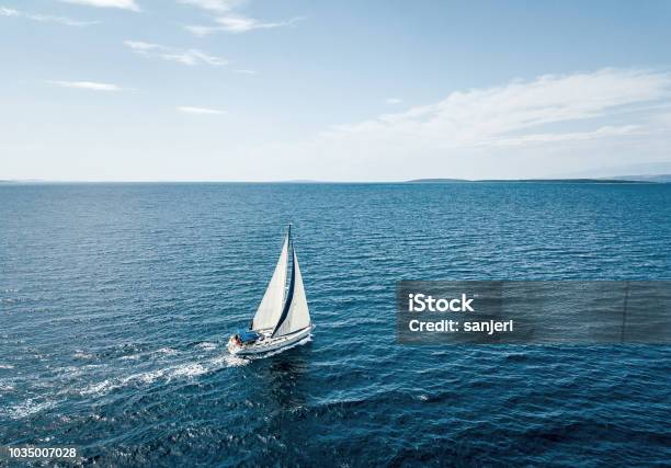 Aerial View Of A Sailing Boat Stock Photo - Download Image Now - Sailboat, Sea, Sailing