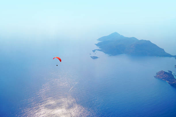 istock Paragliding on Mediterranean Sea. 1035010904