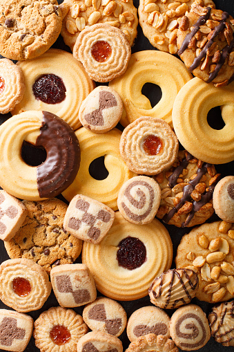 Background of cookies assorted close-up. Vertical view from above
