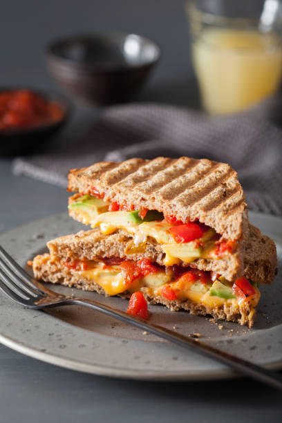 istock grilled cheese sandwich with avocado and tomato 1035016986