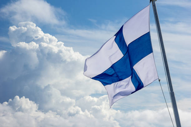 istock sunlit Finnish flag flying in the wind 1035021528