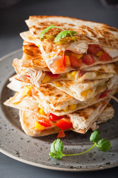 istock mexican quesadilla with chicken, tomato, sweet corn and cheese 1035022146