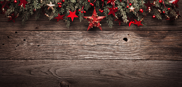 Christmas Fir Tree With Decorations and Red Star On Wooden Background