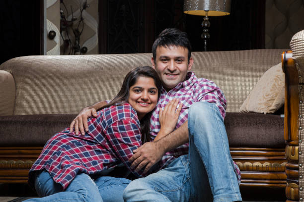 istock Couple at home looking at camera - Stock image 1035026714