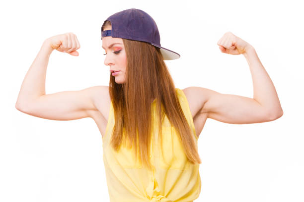 istock Woman casual style showing off muscles biceps 1035030870