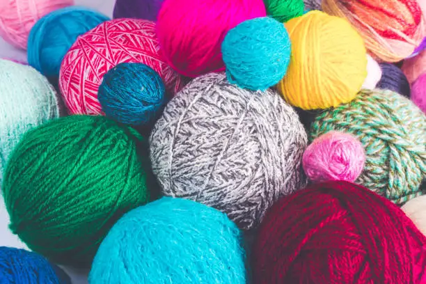 Colored balls of yarn. Colorful background with yarn ball