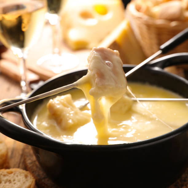 istock cheese fondue with wine and bread 1035038396