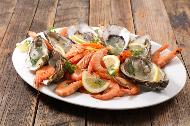 istock shrimp and oyster 1035038474