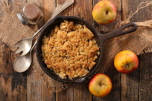 crumble apple on wood background