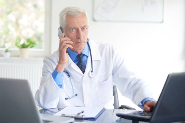 istock Male doctor making call 1035038722