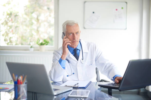 istock Male doctor making call 1035038734