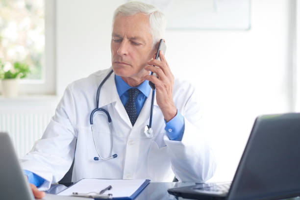 istock Male doctor making call 1035038748