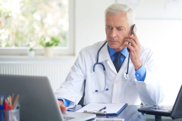 istock Male doctor making call 1035038780