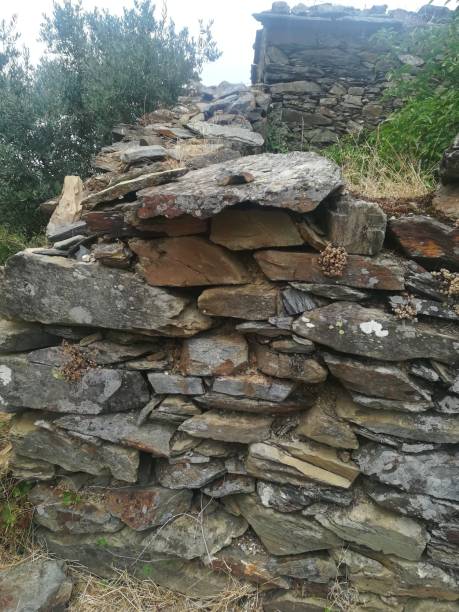 istock Old wall of shale stones 1035043314