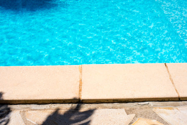 istock Ripple Water in swimming pool witn sun reflection 1035043744