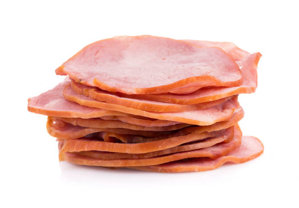 istock Sliced smoked ham isolated on white background 1035044580