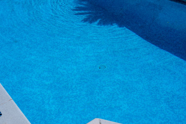 istock Ripple Water in swimming pool witn sun reflection 1035044770