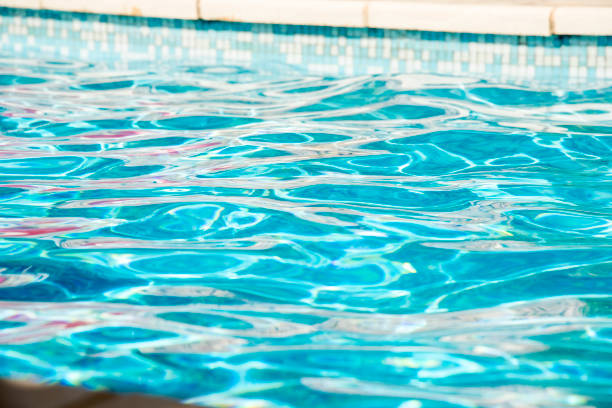 istock Ripple Water in swimming pool witn sun reflection 1035044774