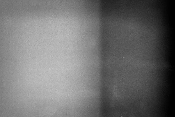 istock Noisy film frame with heavy noise, dust and grain 1035045310