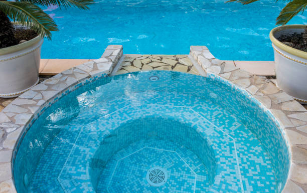 istock Ripple Water in swimming pool witn sun reflection 1035048350