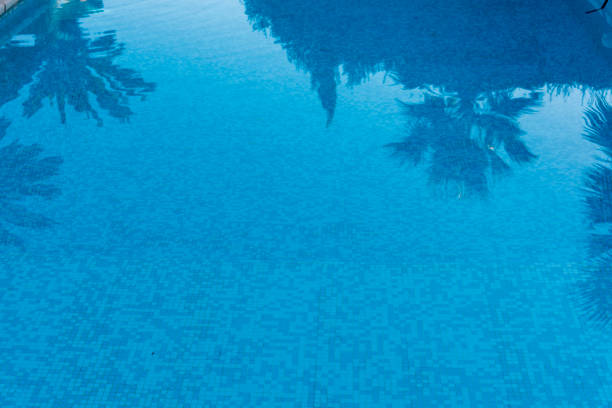 istock Ripple Water in swimming pool witn sun reflection 1035048444