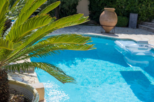 istock Ripple Water in swimming pool witn sun reflection 1035052280