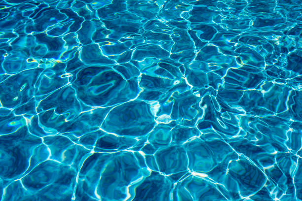 istock Ripple Water in swimming pool witn sun reflection 1035053152