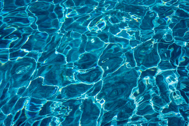 istock Ripple Water in swimming pool witn sun reflection 1035053444