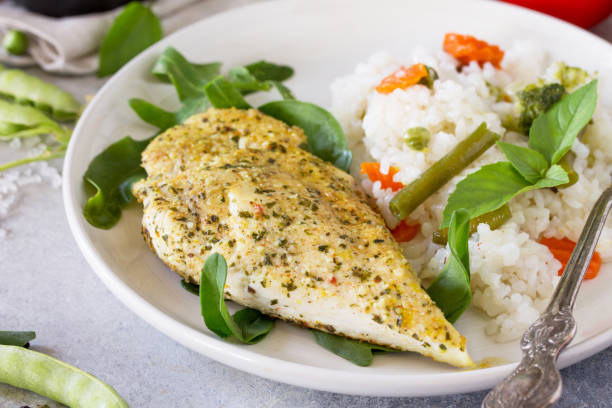 istock Healthy food: Roast chicken meat and Fried rice with vegetables, close-up. Diet menu. 1035057408
