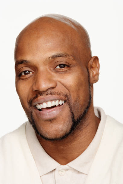istock Close up studio shot of African man smiling 1035063798