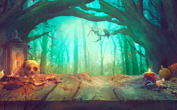 istock Halloween theme with pumpkins and dark forest. Spooky Halloween 1035065822